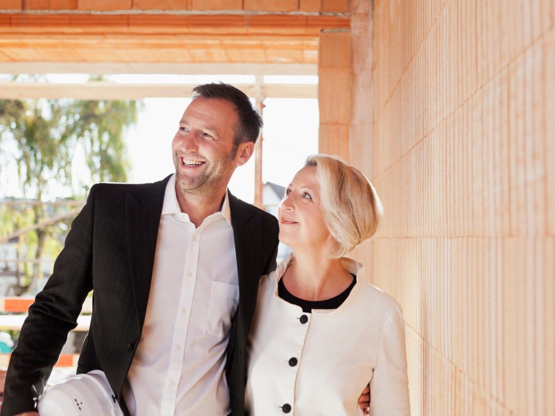 Man and woman at construction site