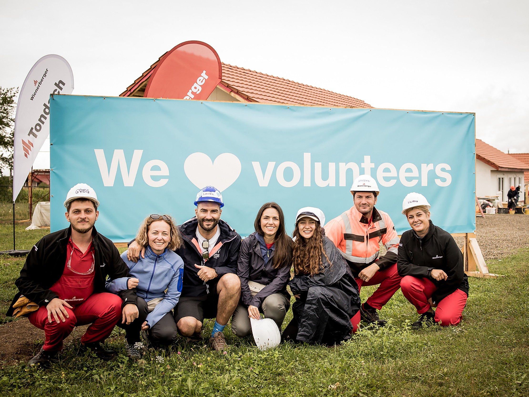 Habitat for Humanity - people building houses