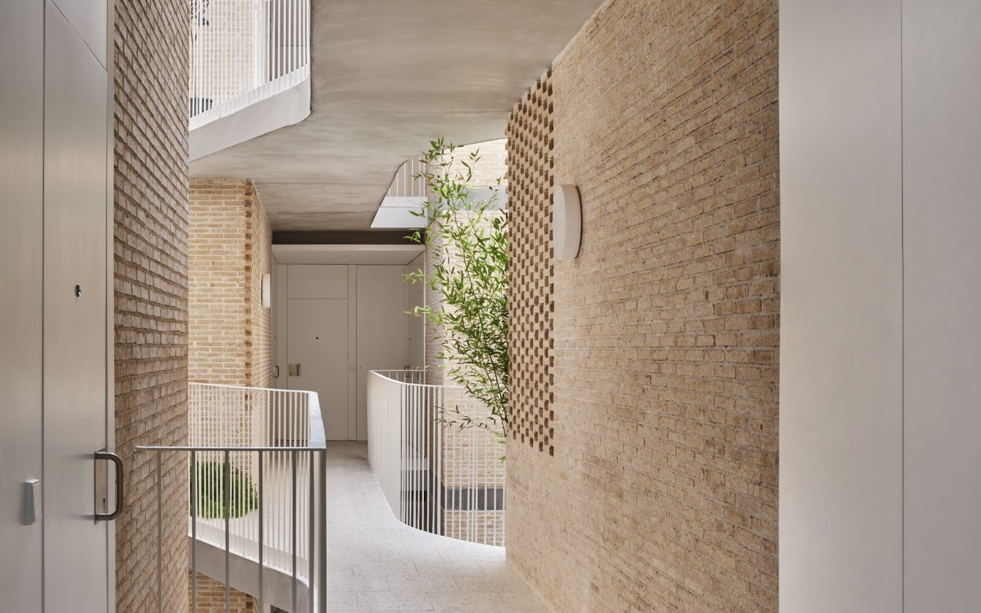 Brick Award 26 Nominee SOCIAL ATRIUM - 54 DWELLINGS IN THE BESÒS - Peris+Toral