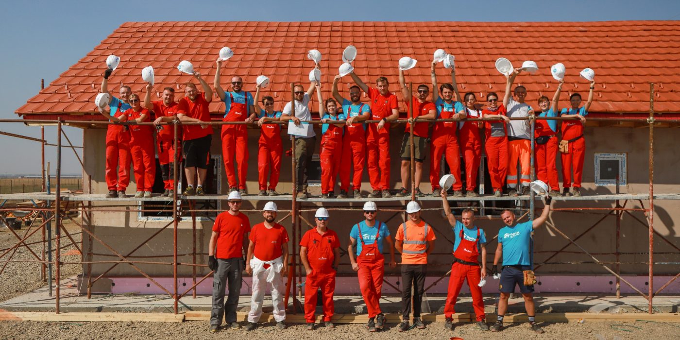people cheering on a construction site
