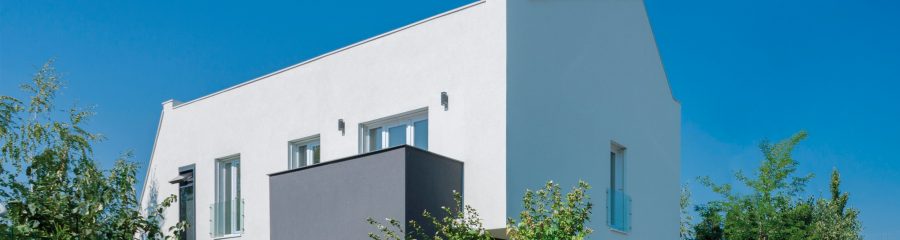 e4 house view from outside green fence